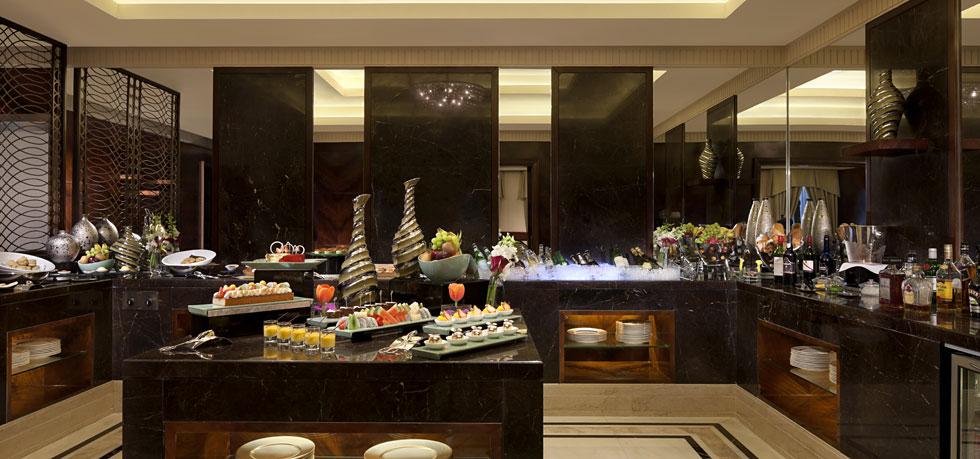 a buffet table with food on it