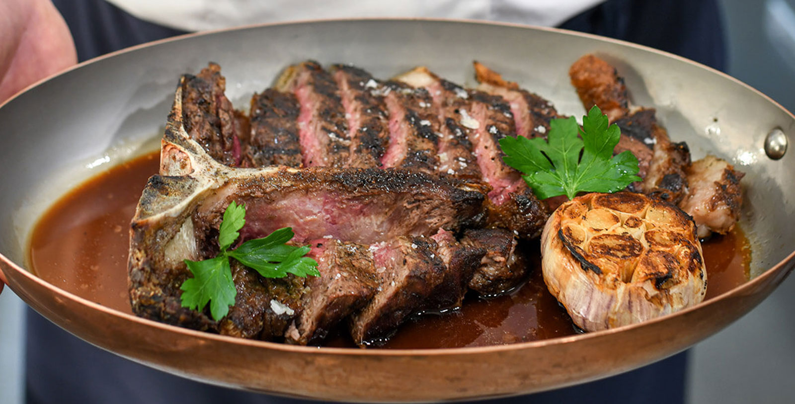 a plate of meat and vegetables