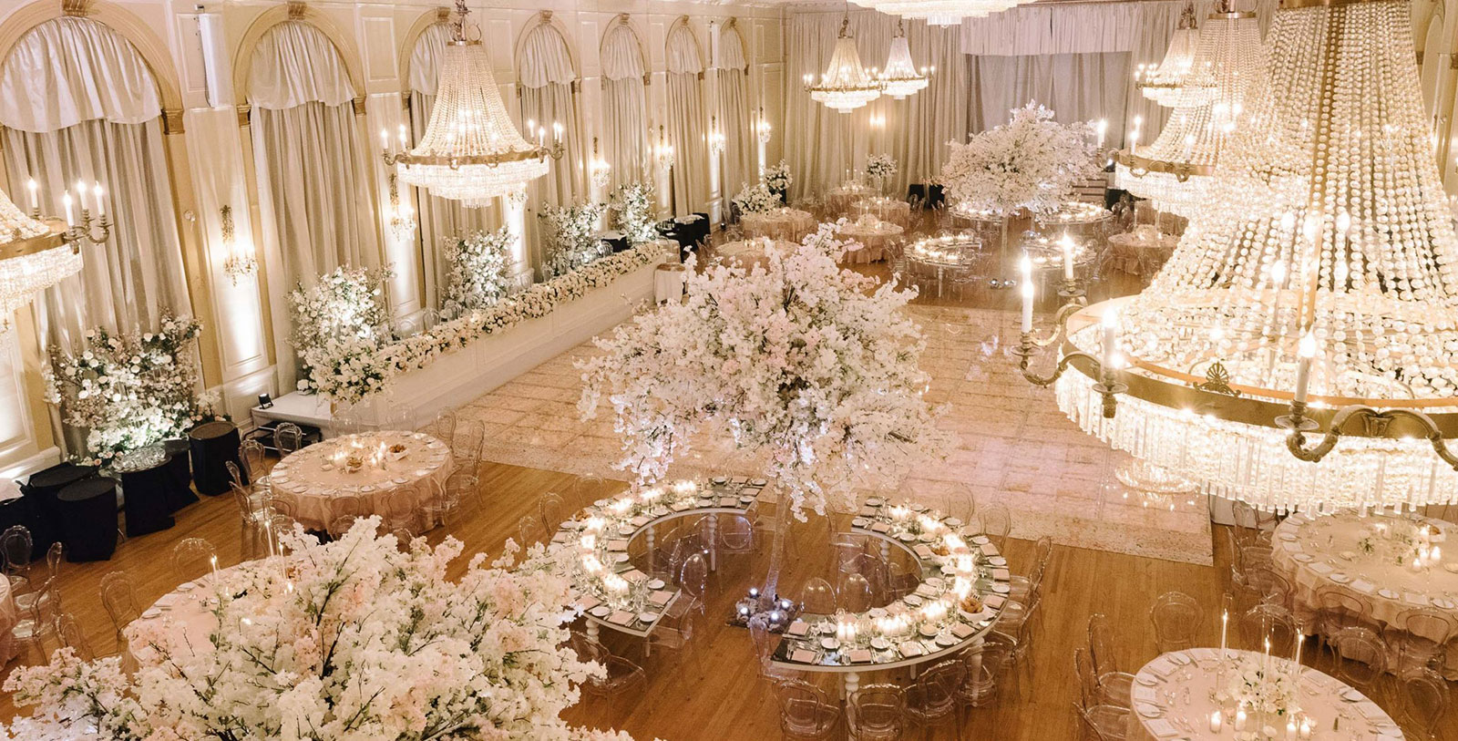 a large ballroom with tables and chairs