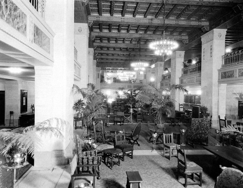 a large room with many chairs and tables