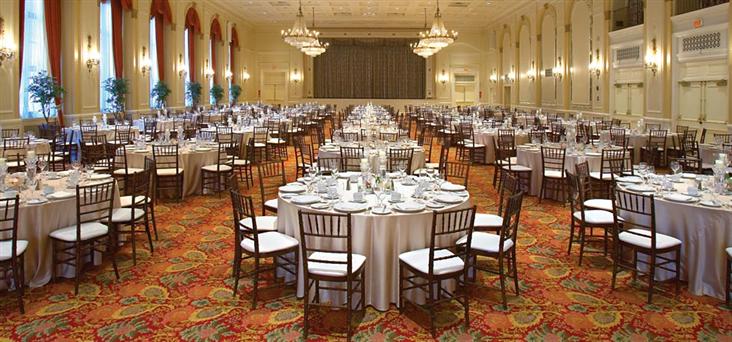 a large room with tables and chairs