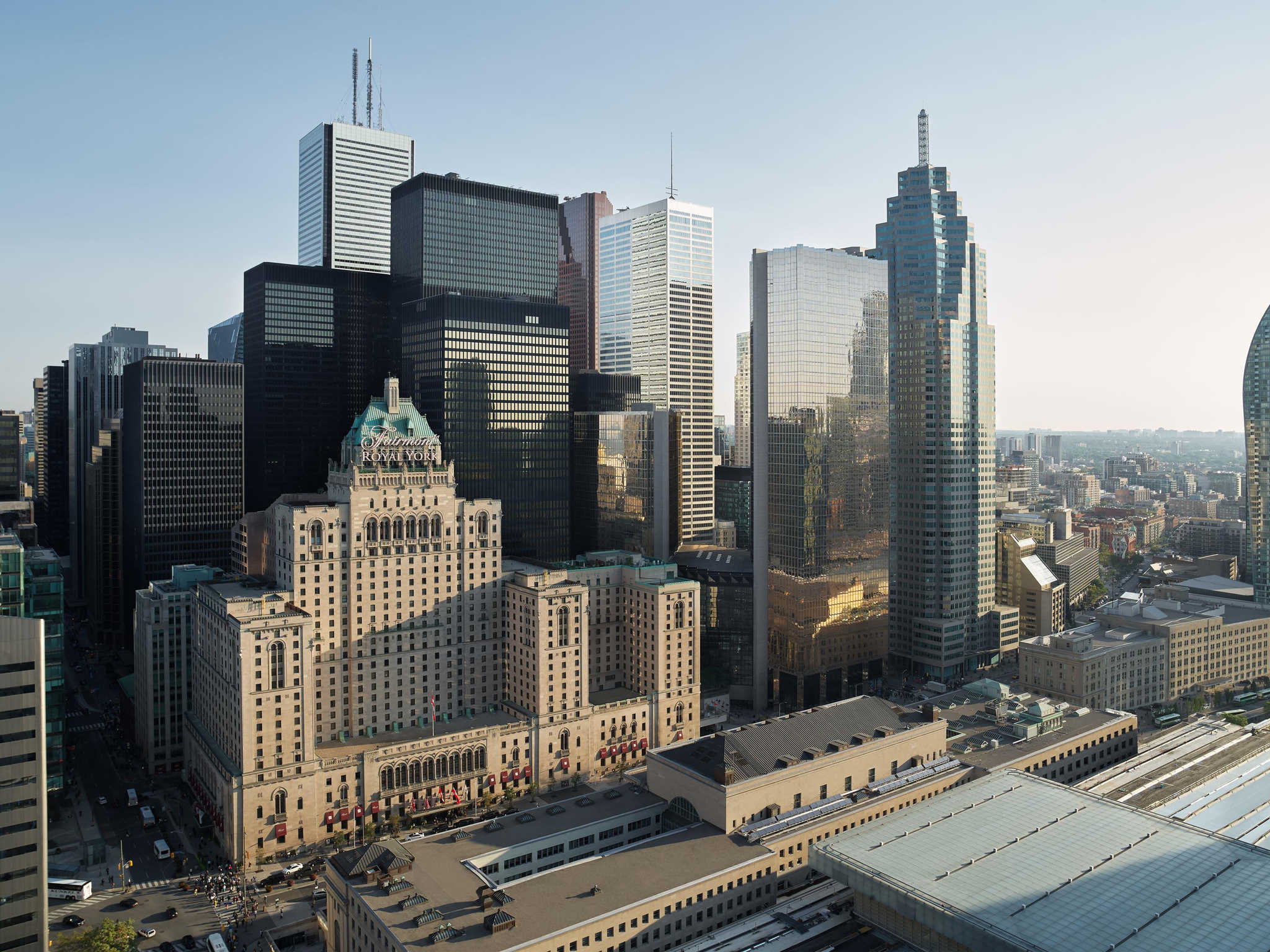 a city skyline with many tall buildings