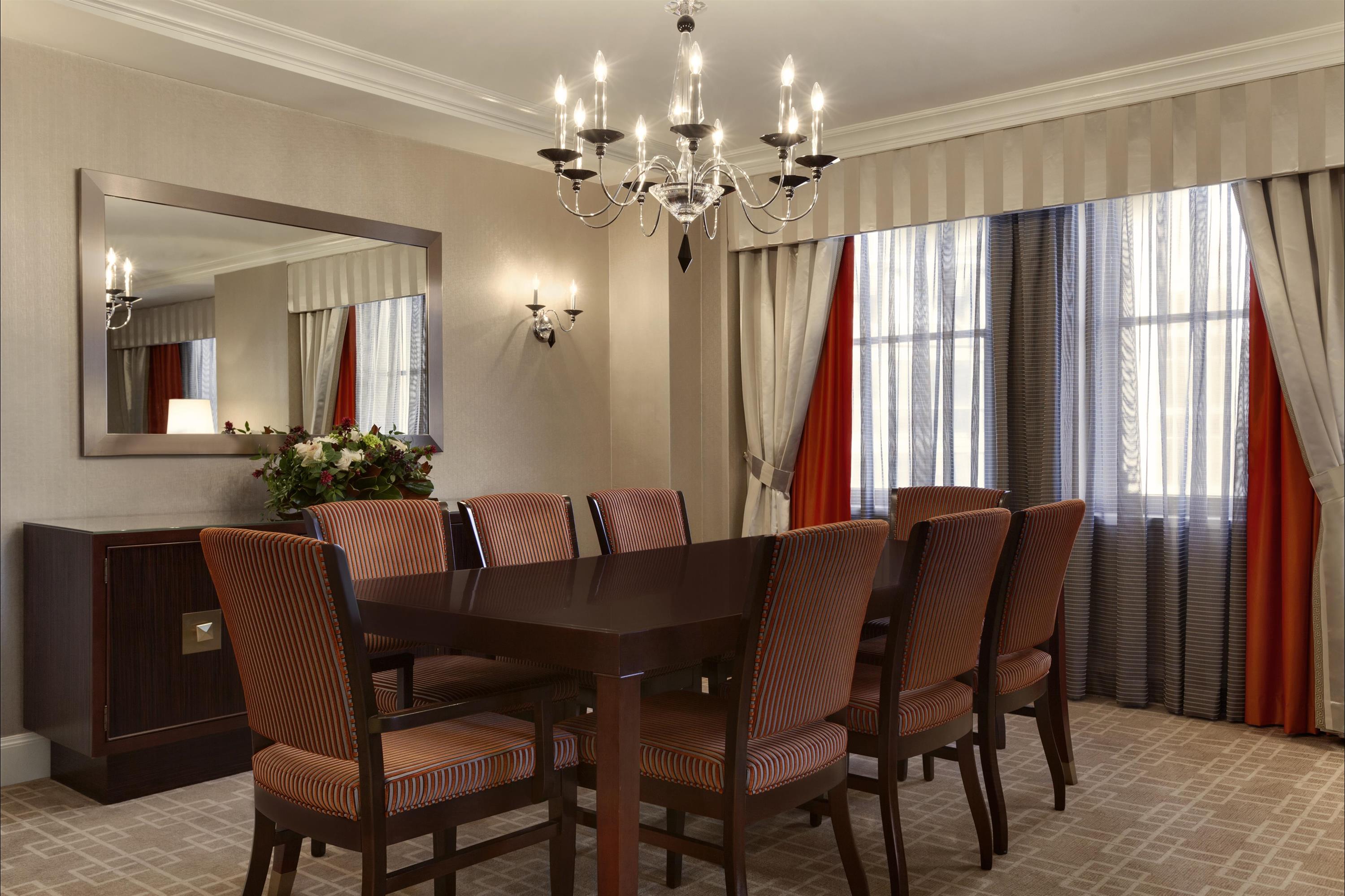 a room with a table and chairs