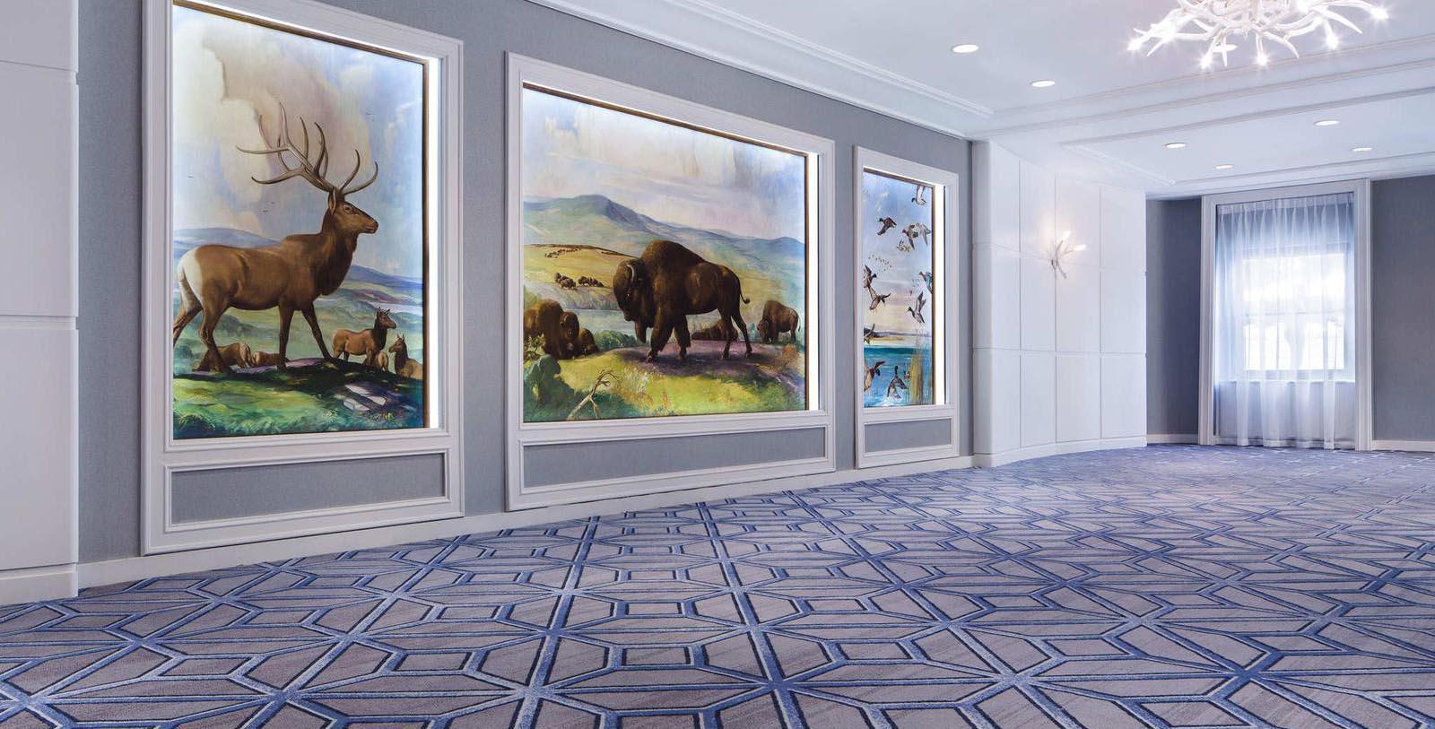 a room with paintings on the wall