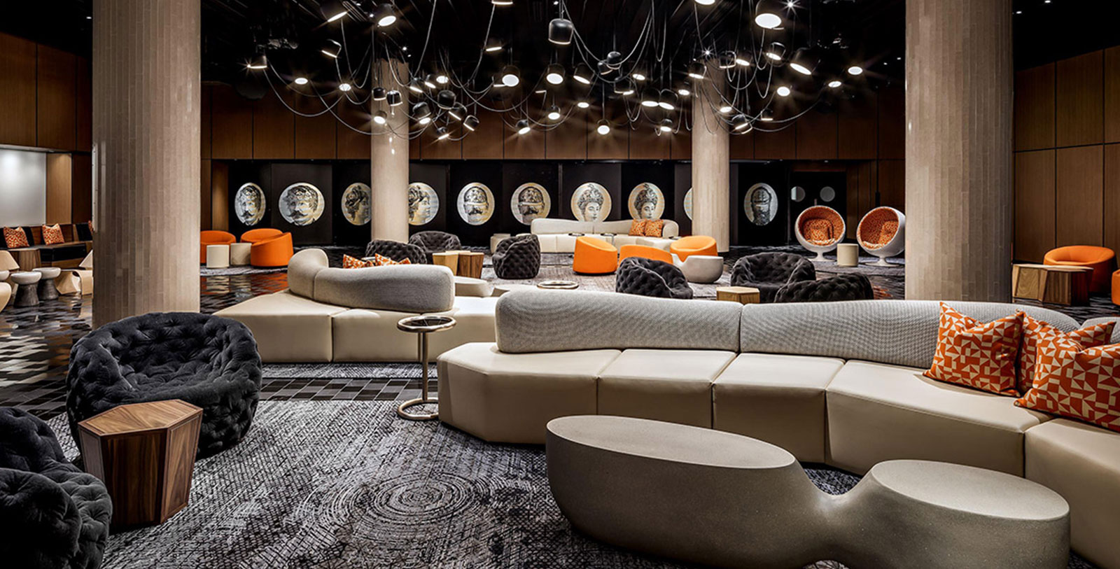 a large room with couches and chairs