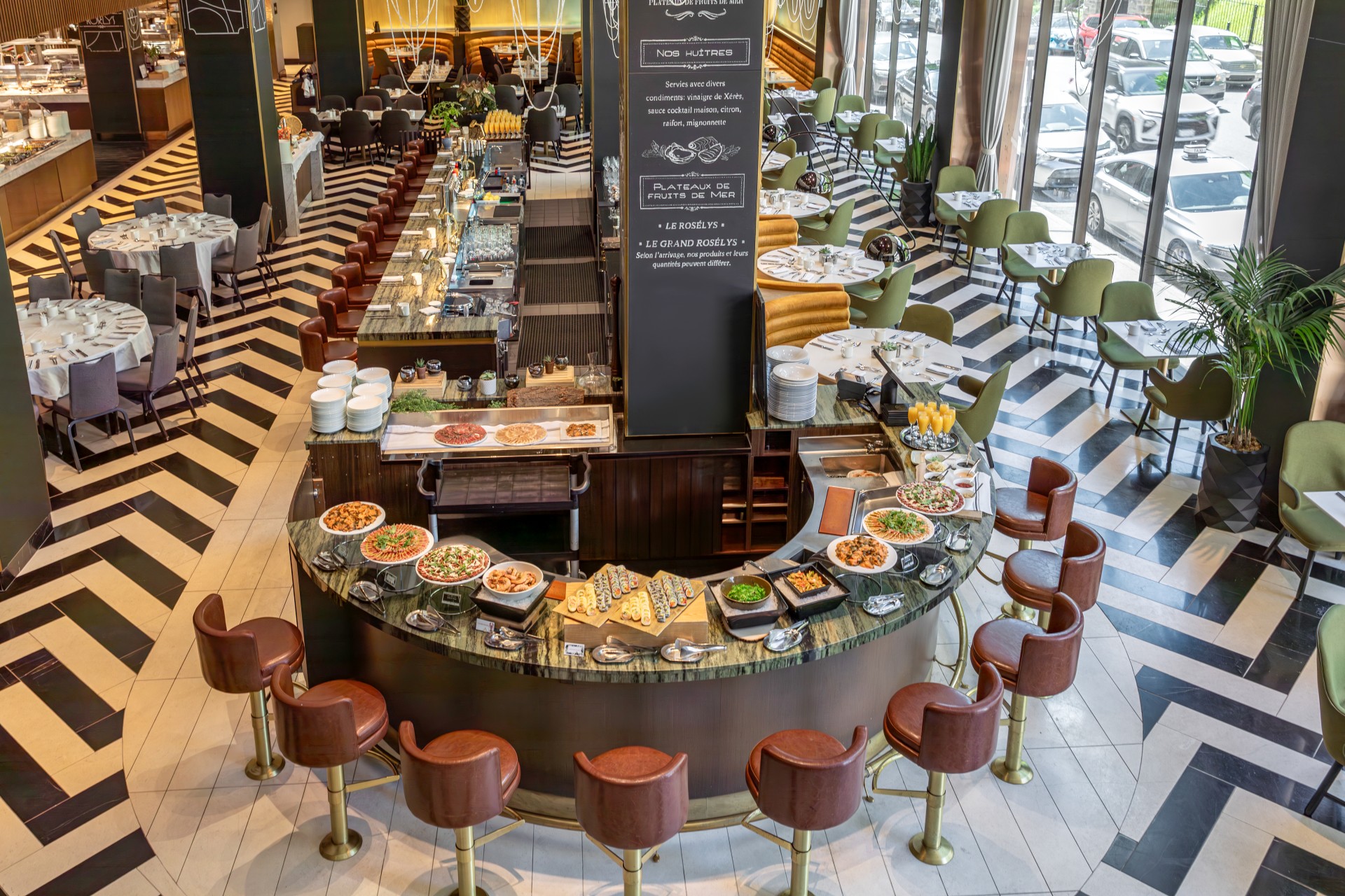 a restaurant with a large counter with food on it
