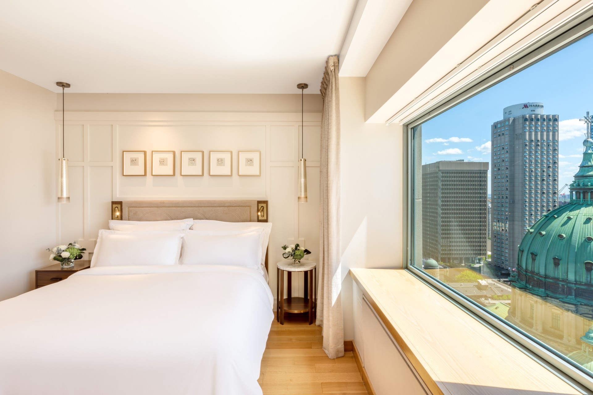 a bedroom with a large window
