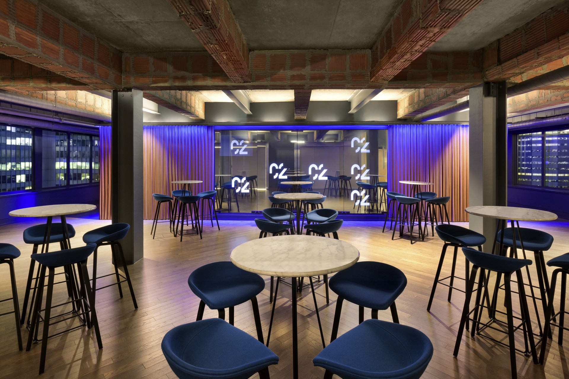 a room with tables and chairs