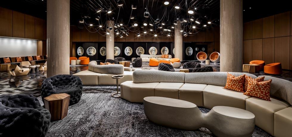 a large room with couches and chairs