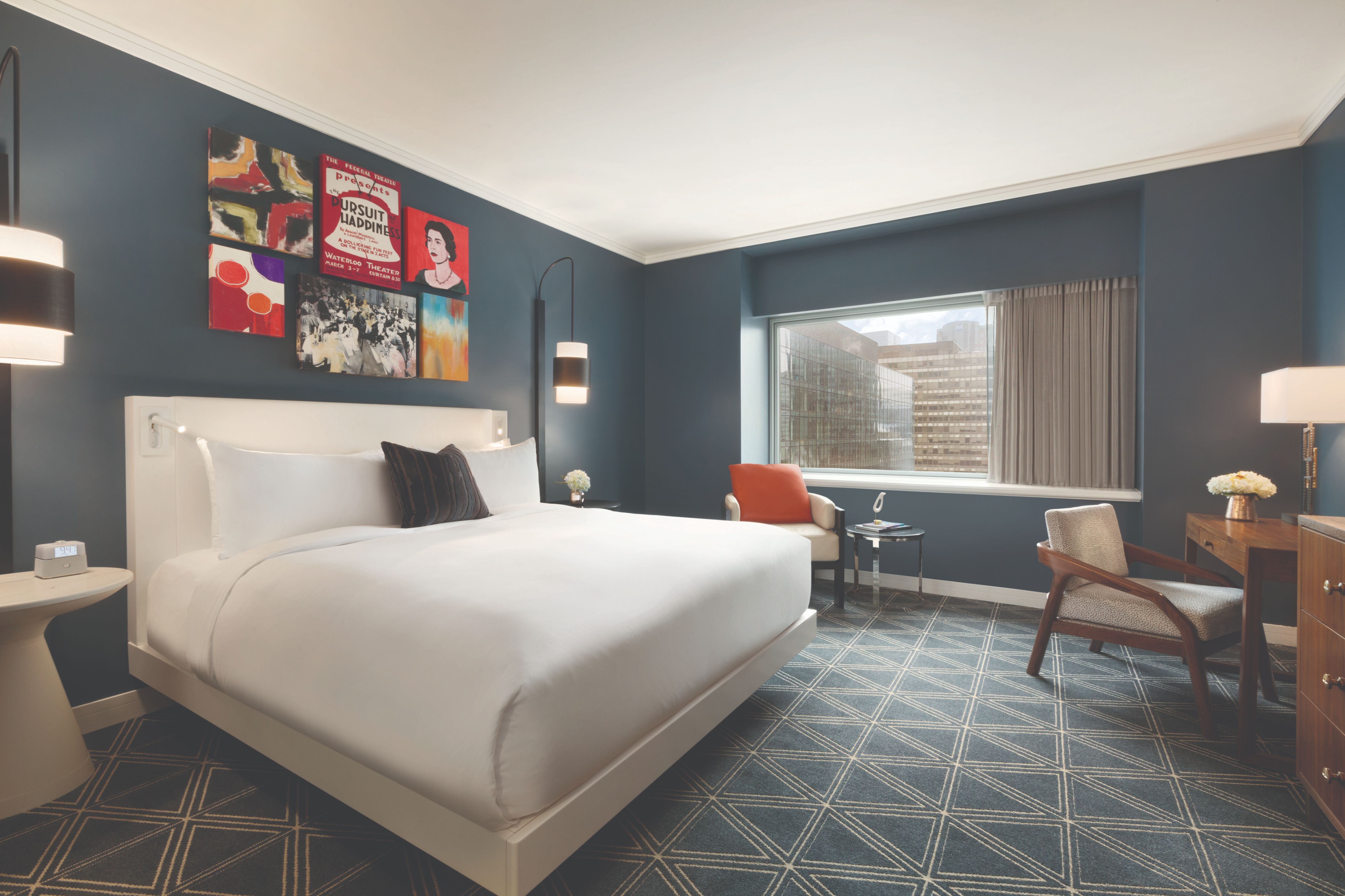 a room with a bed and chair