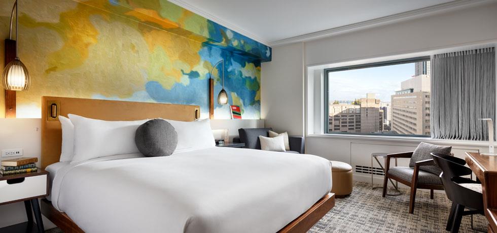 a room with a bed and a window