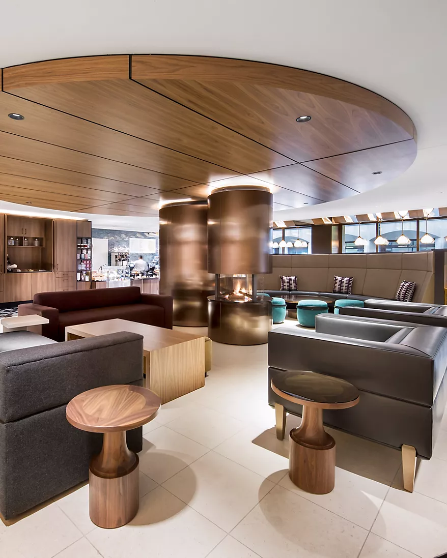 a room with couches and tables
