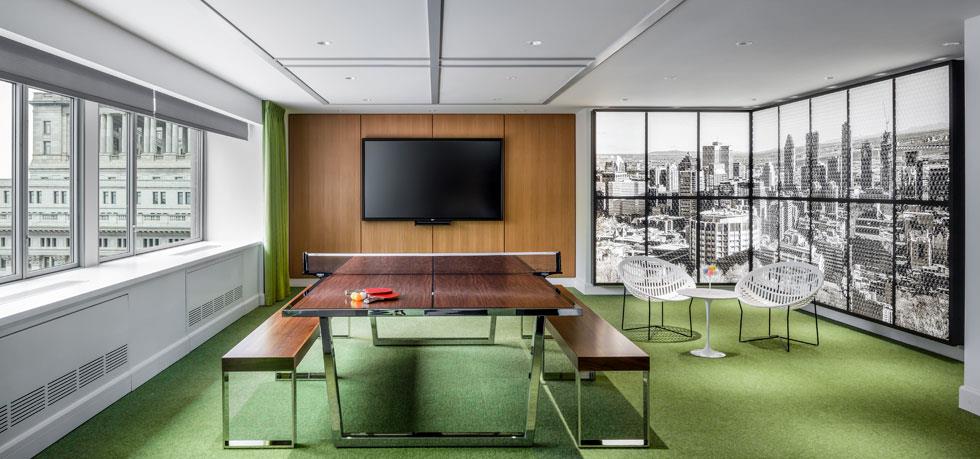 a room with a table and benches