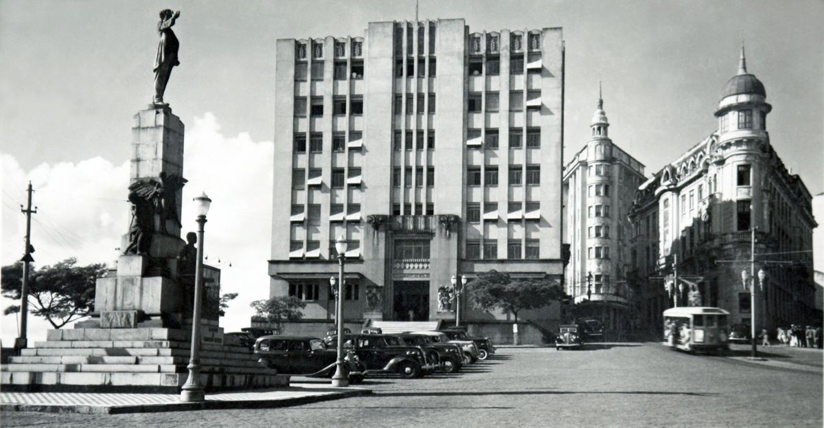 a building with cars parked in front of it