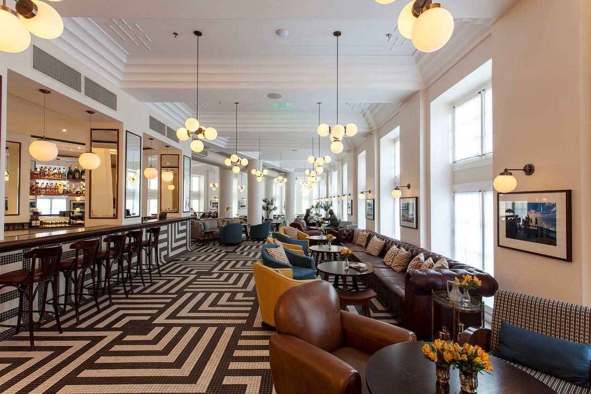 a room with chairs and tables