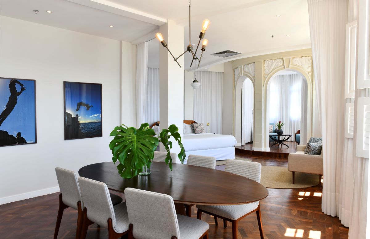 a room with a table and chairs