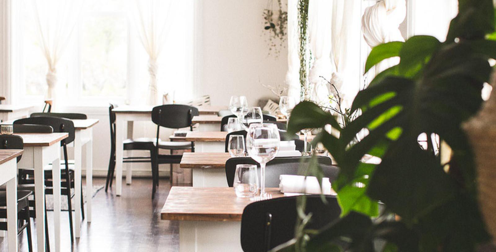 a room with tables and chairs