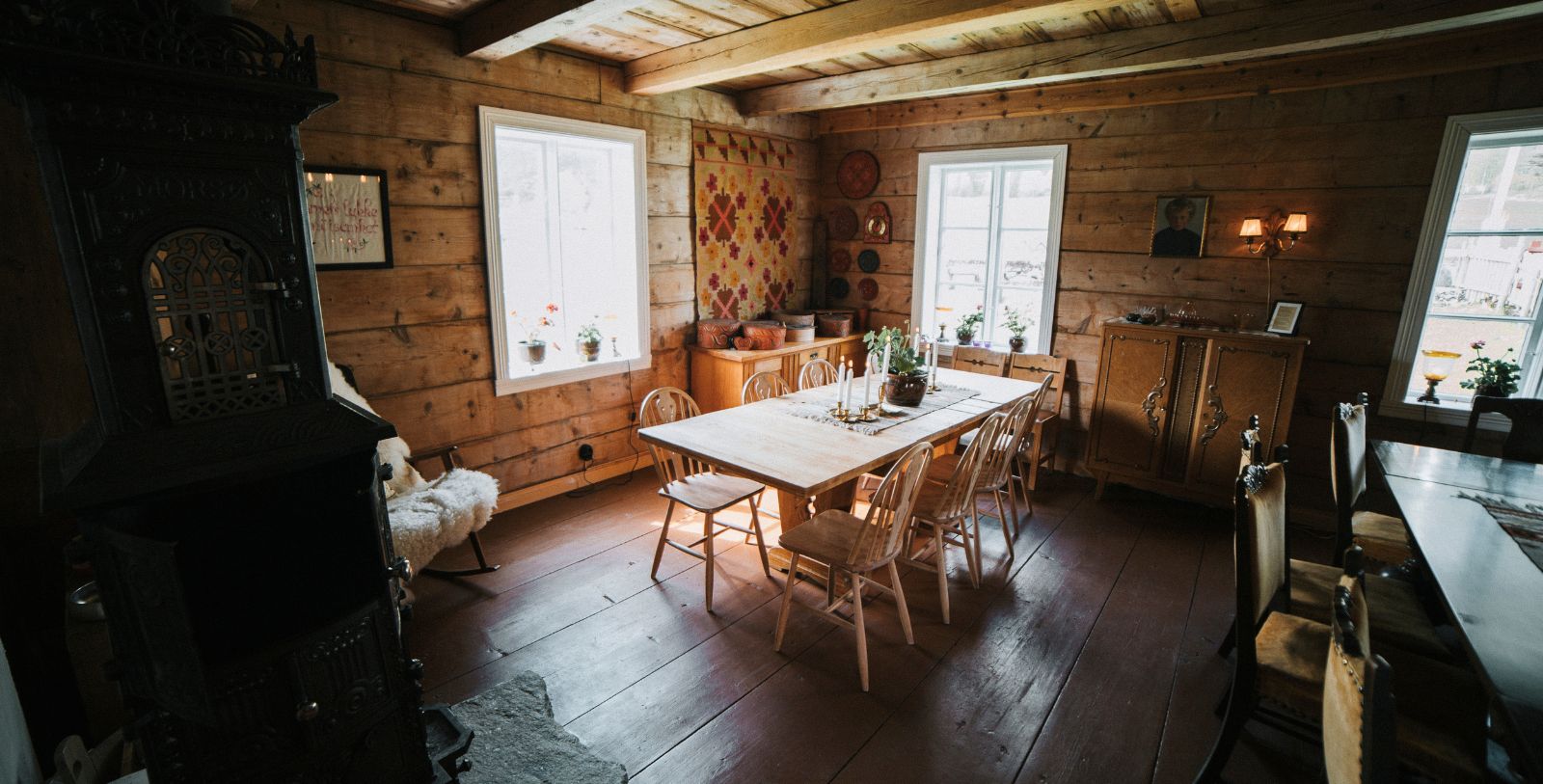 a room with a table and chairs