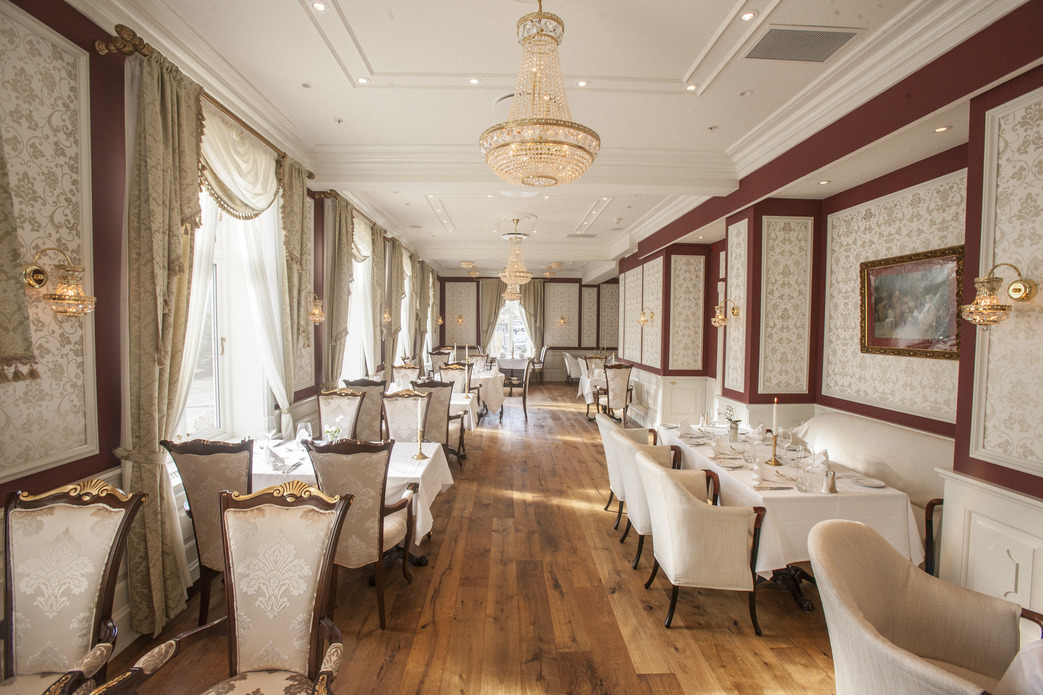 a room with tables and chairs