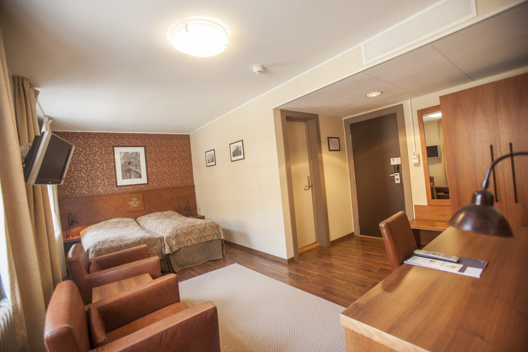 a room with a bed and a table