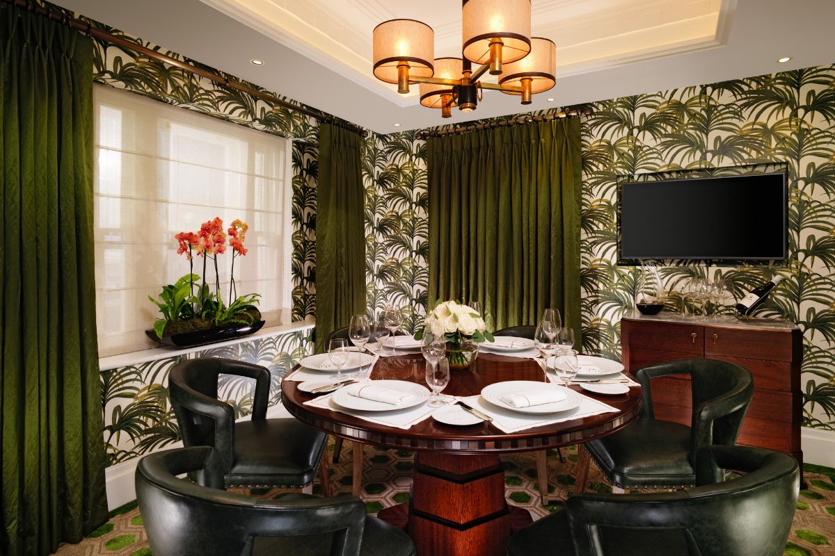 a room with a table and chairs