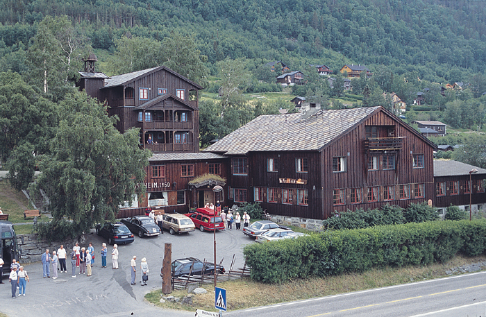 a group of people standing outside of a building