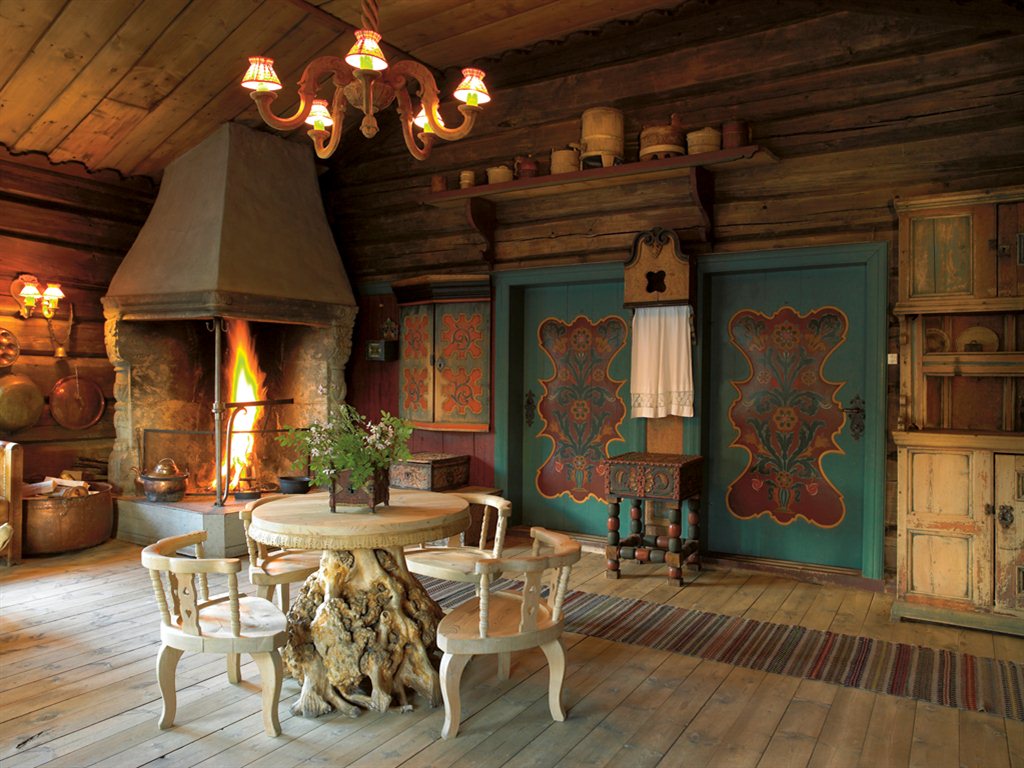 a room with a fireplace and a table