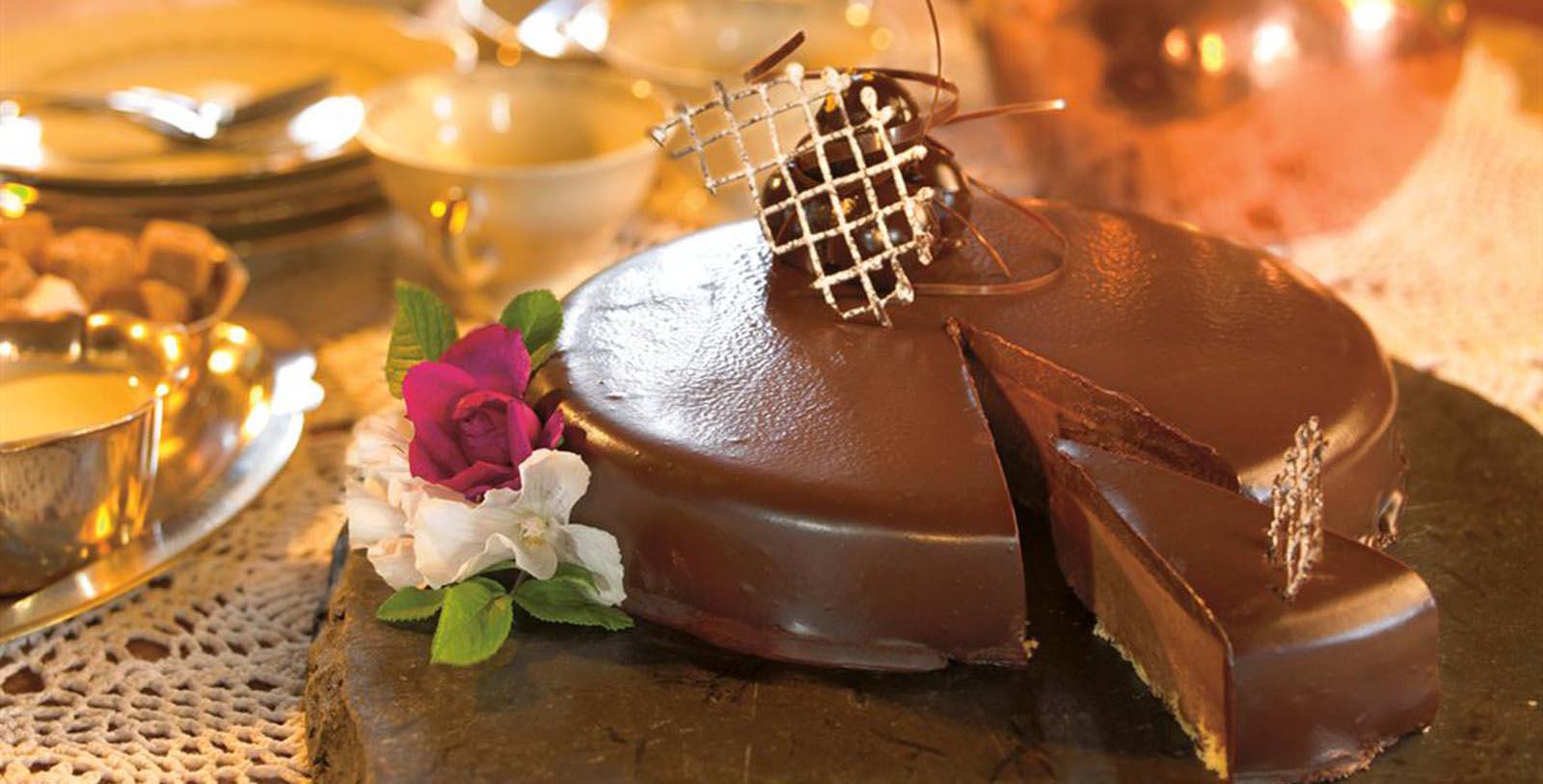 a chocolate cake with a slice cut out