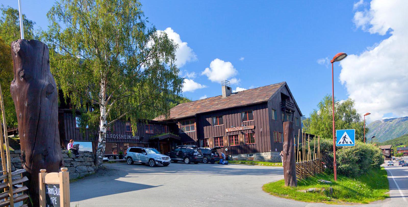 a building with cars parked in front of it