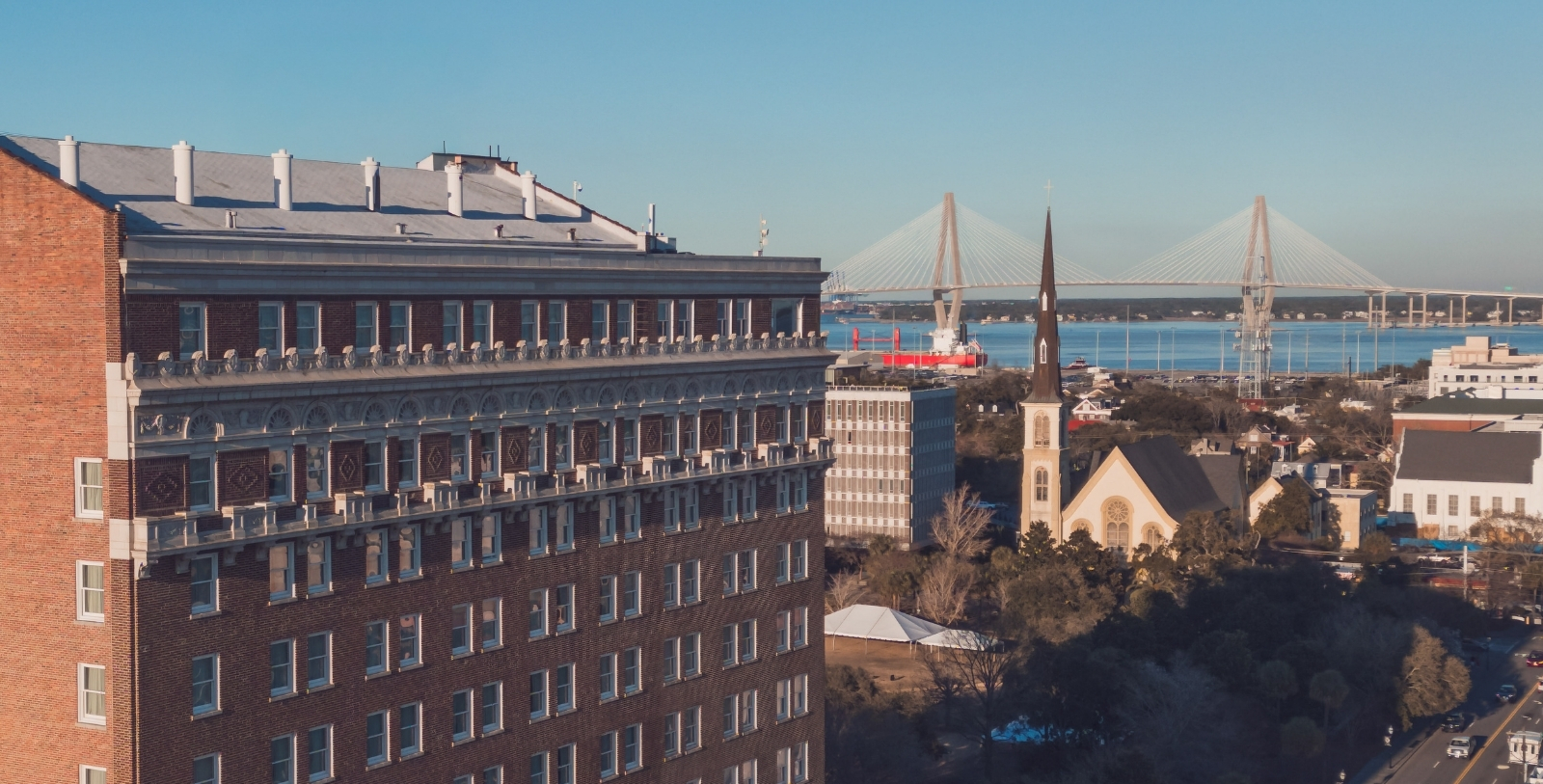 a building with a bridge in the background