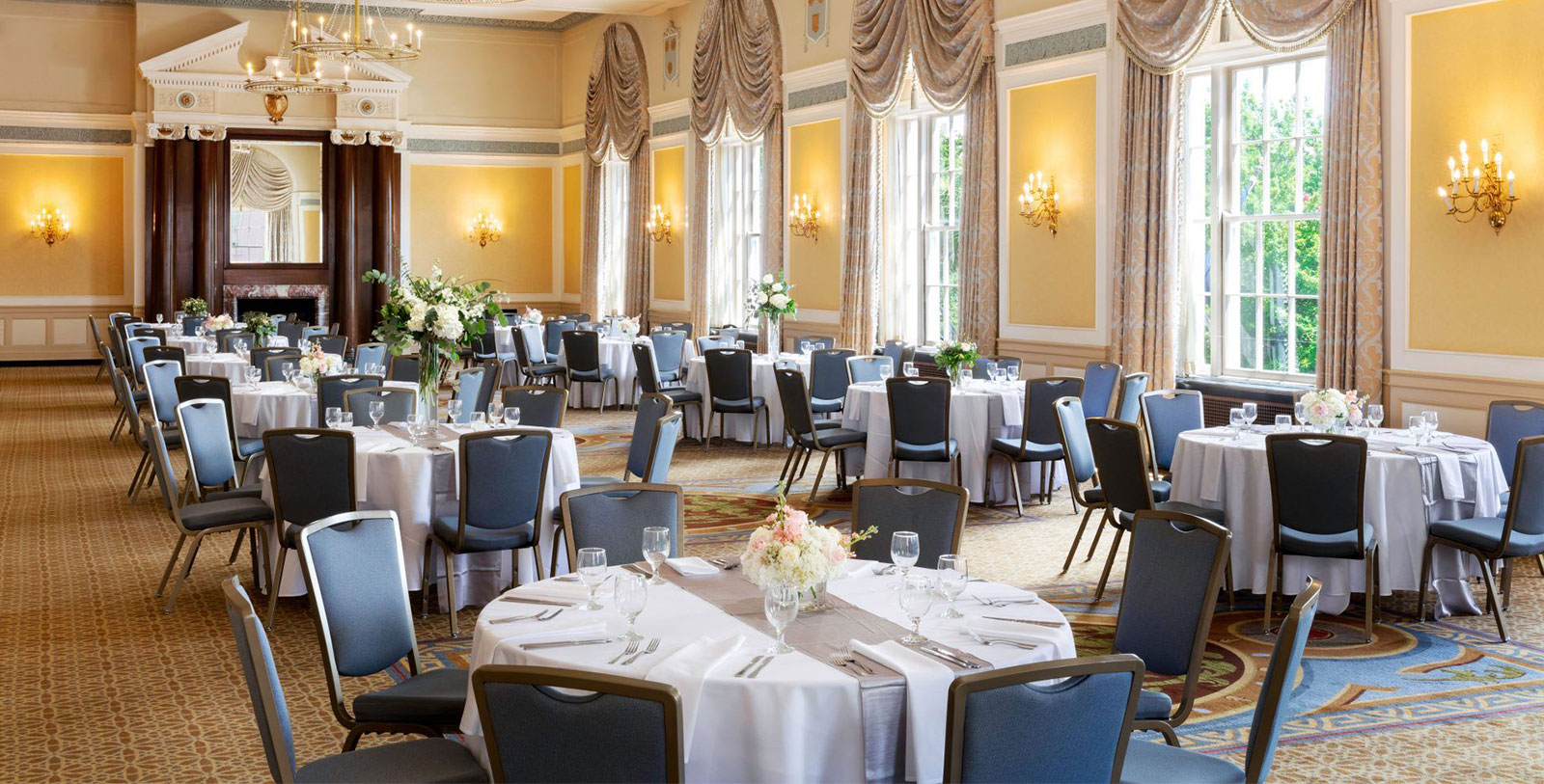 a room with tables and chairs