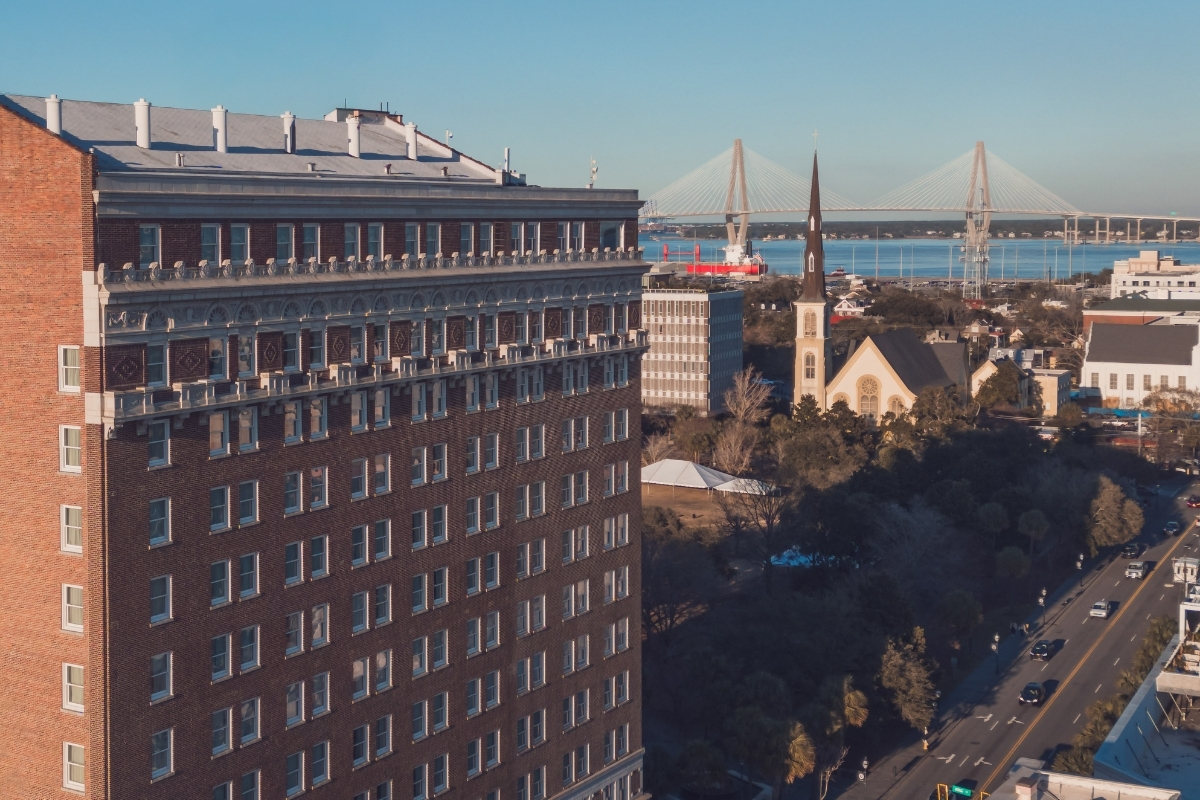 a building with a bridge in the background
