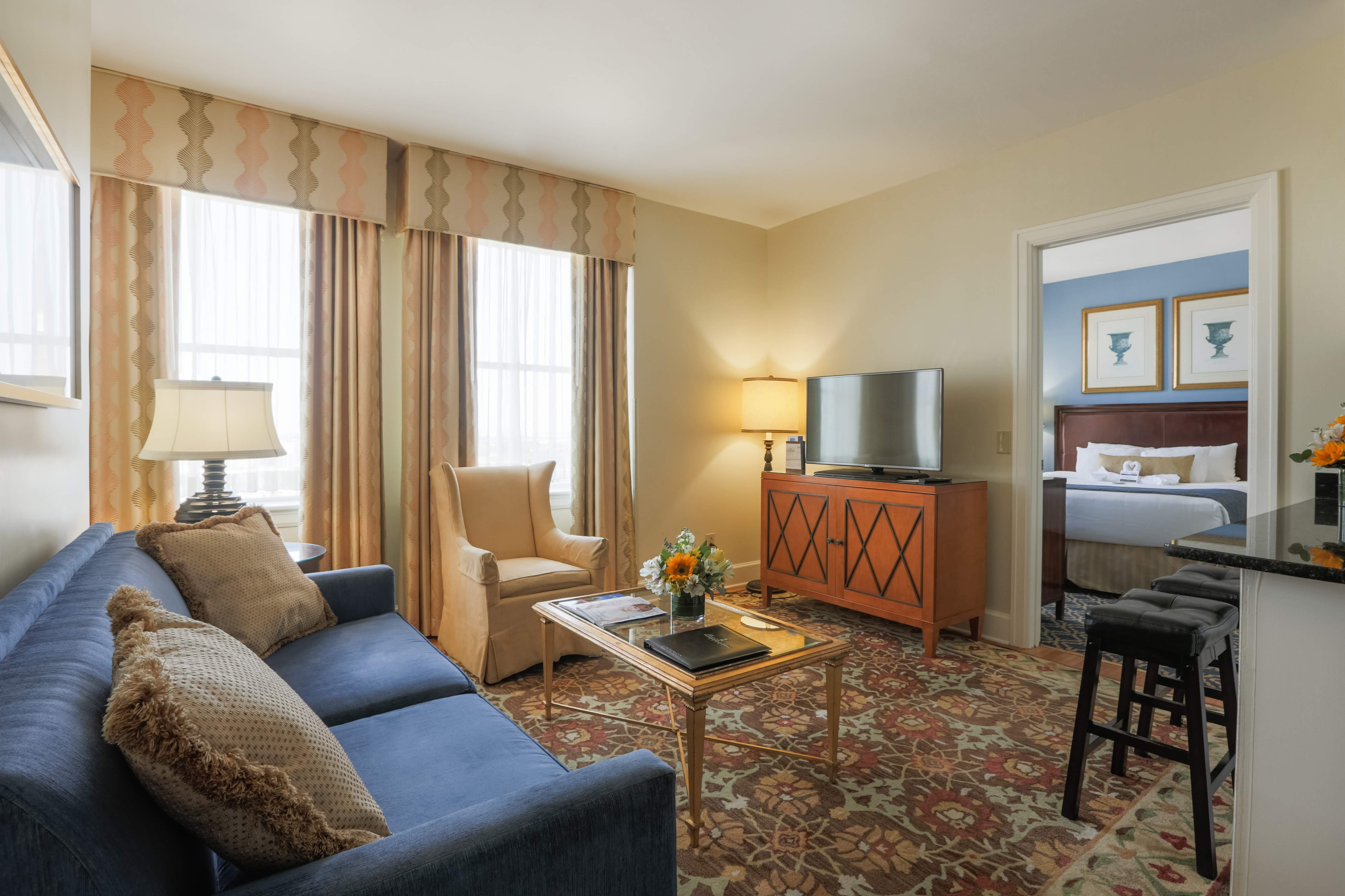 a room with a television and couches