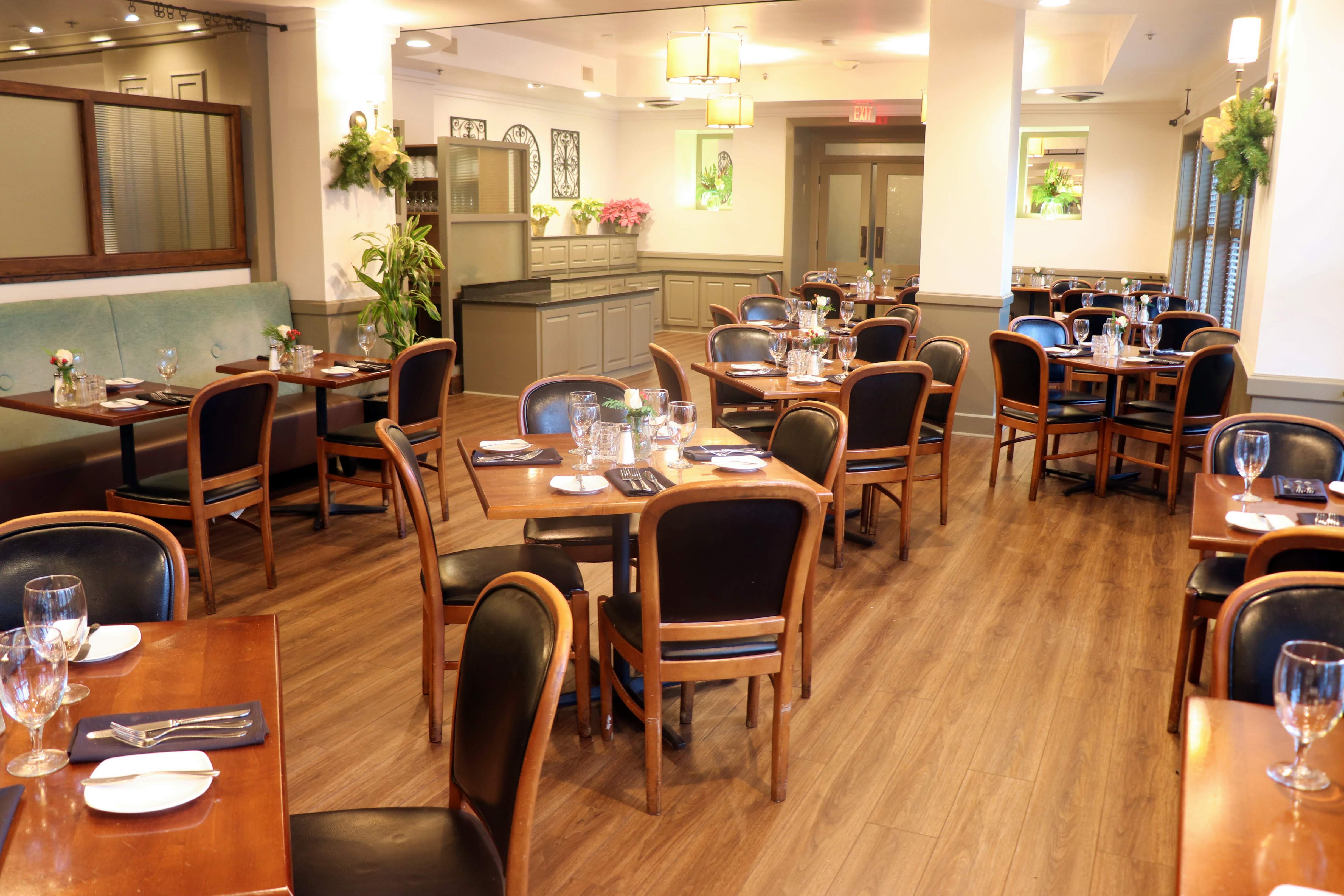 a restaurant with tables and chairs
