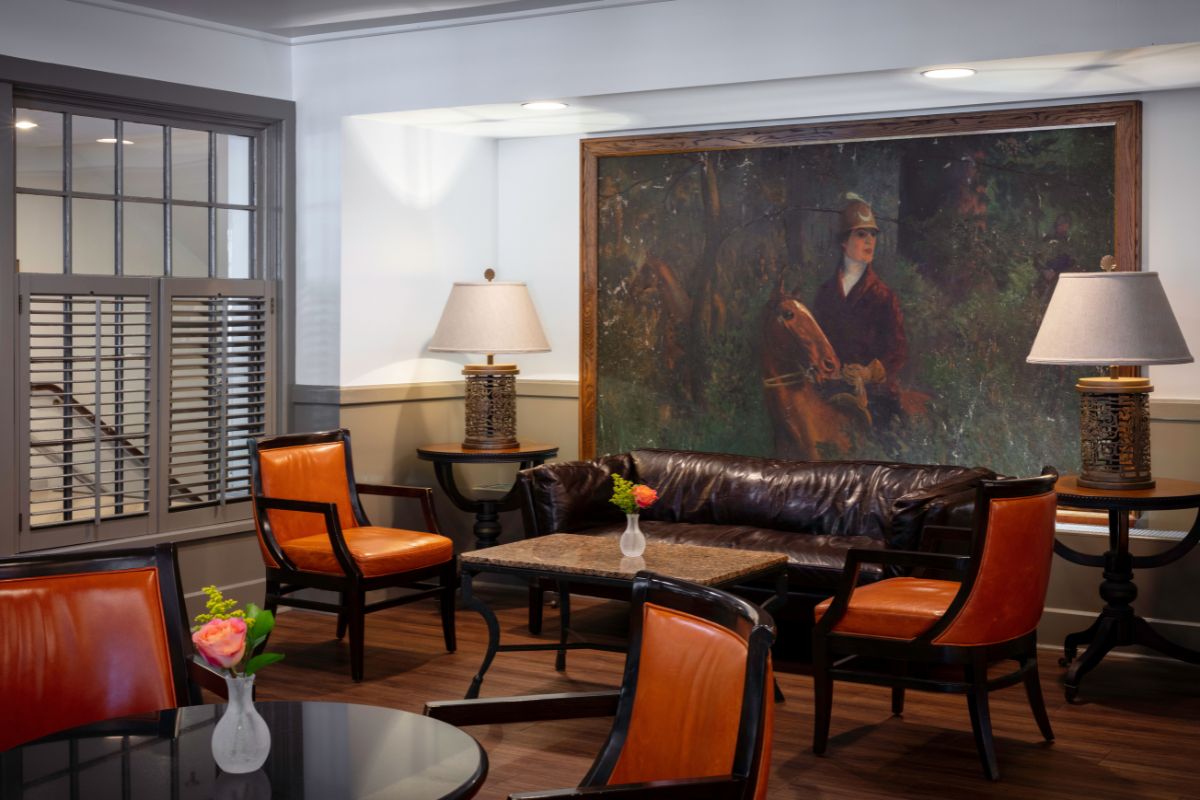 a room with a painting on the wall