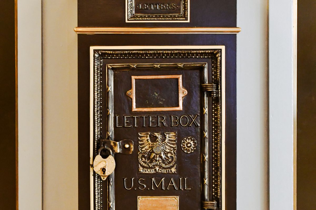 a brown and gold mailbox