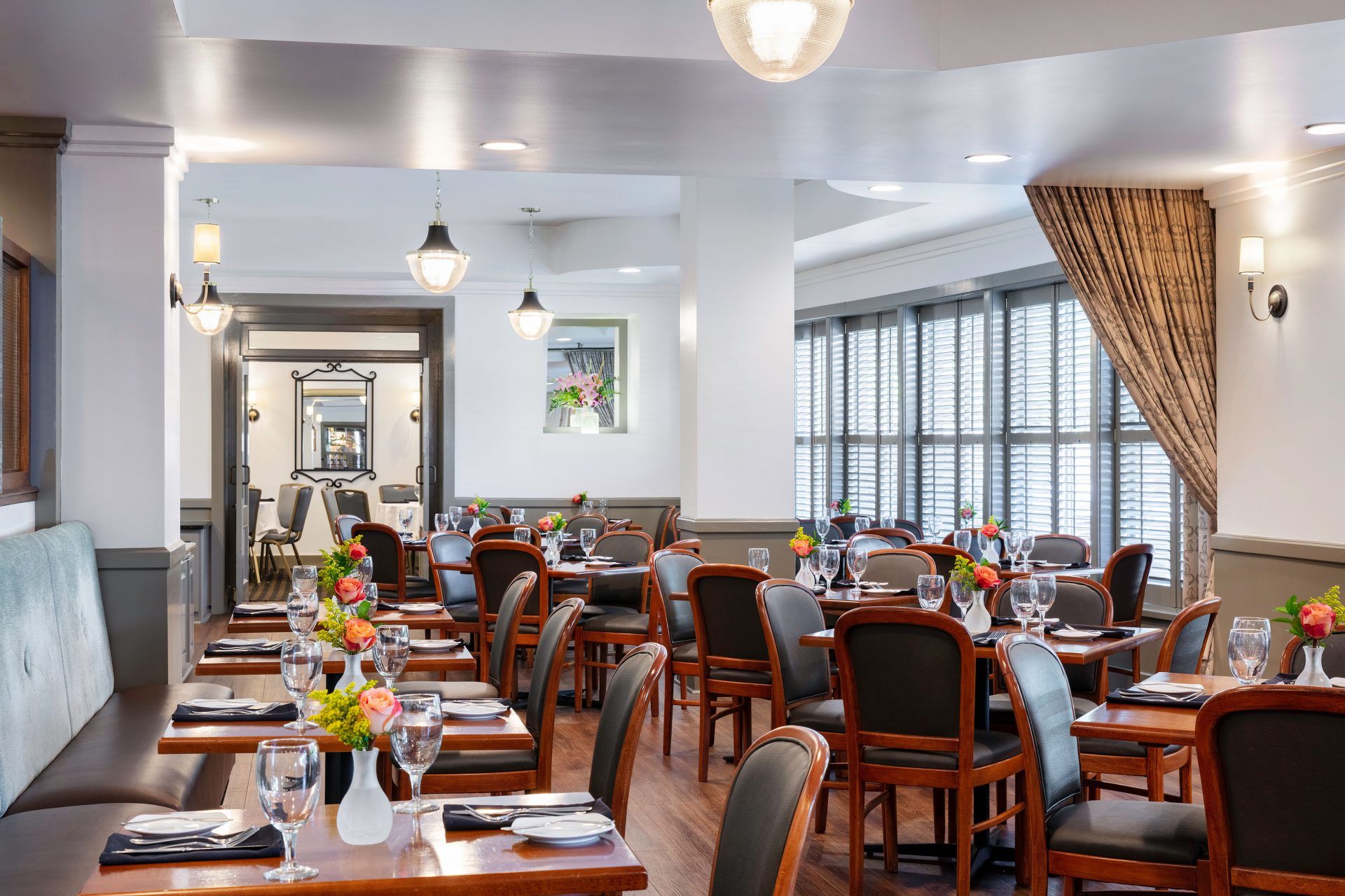 a room with tables and chairs