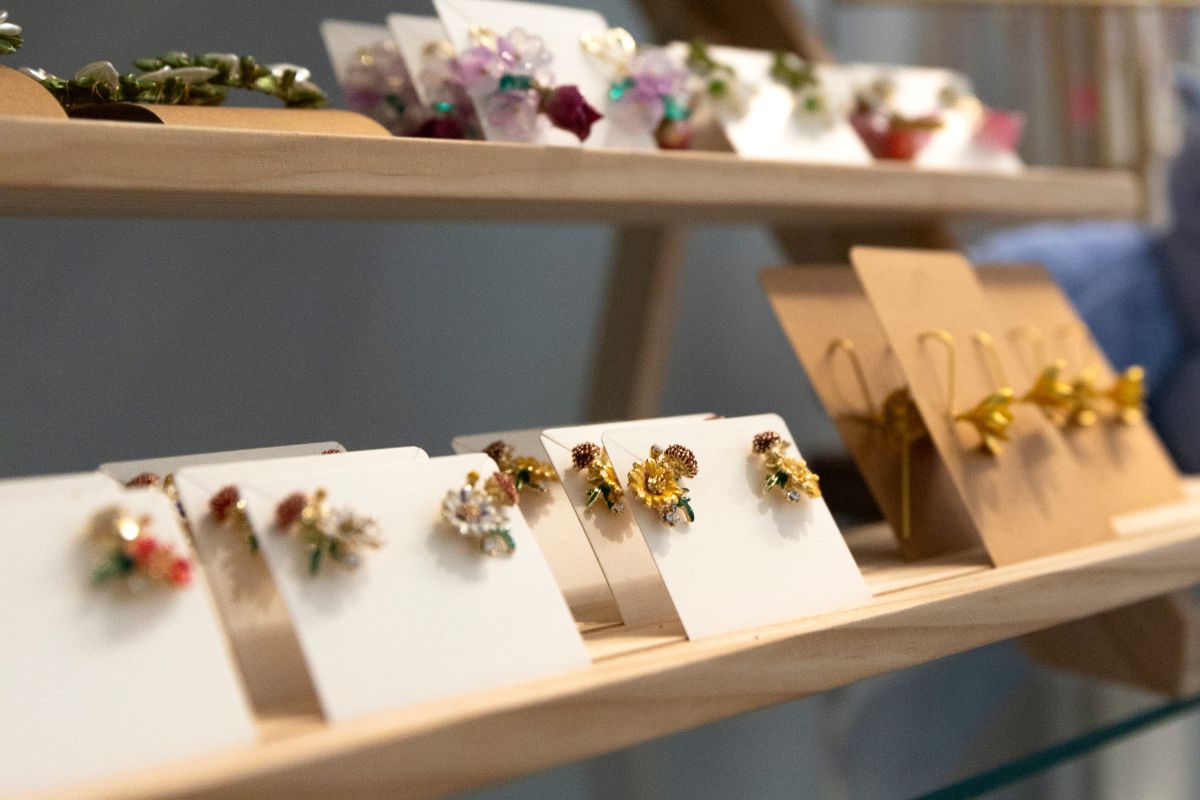 a display of earrings on a shelf