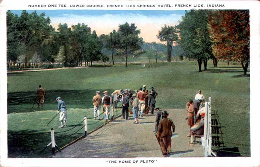 a group of people playing golf