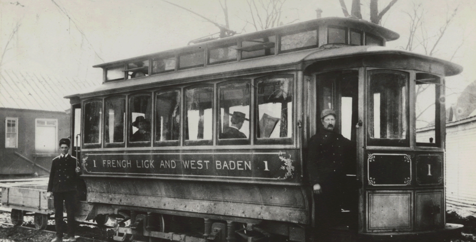 a man standing in a train
