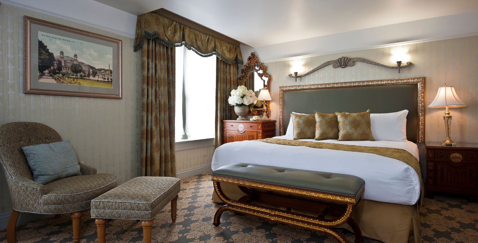 a bedroom with a bed and a mirror