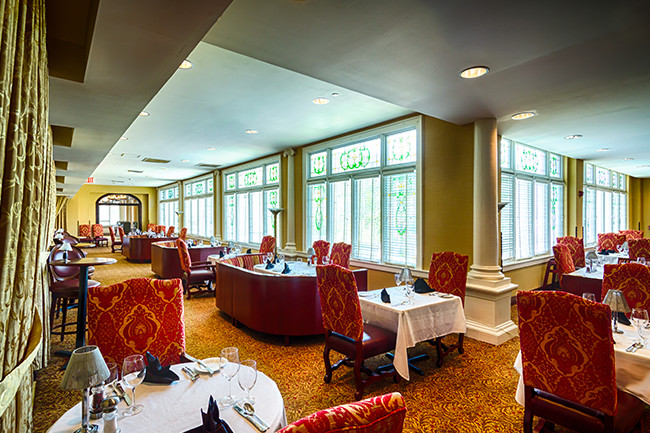 a room with tables and chairs
