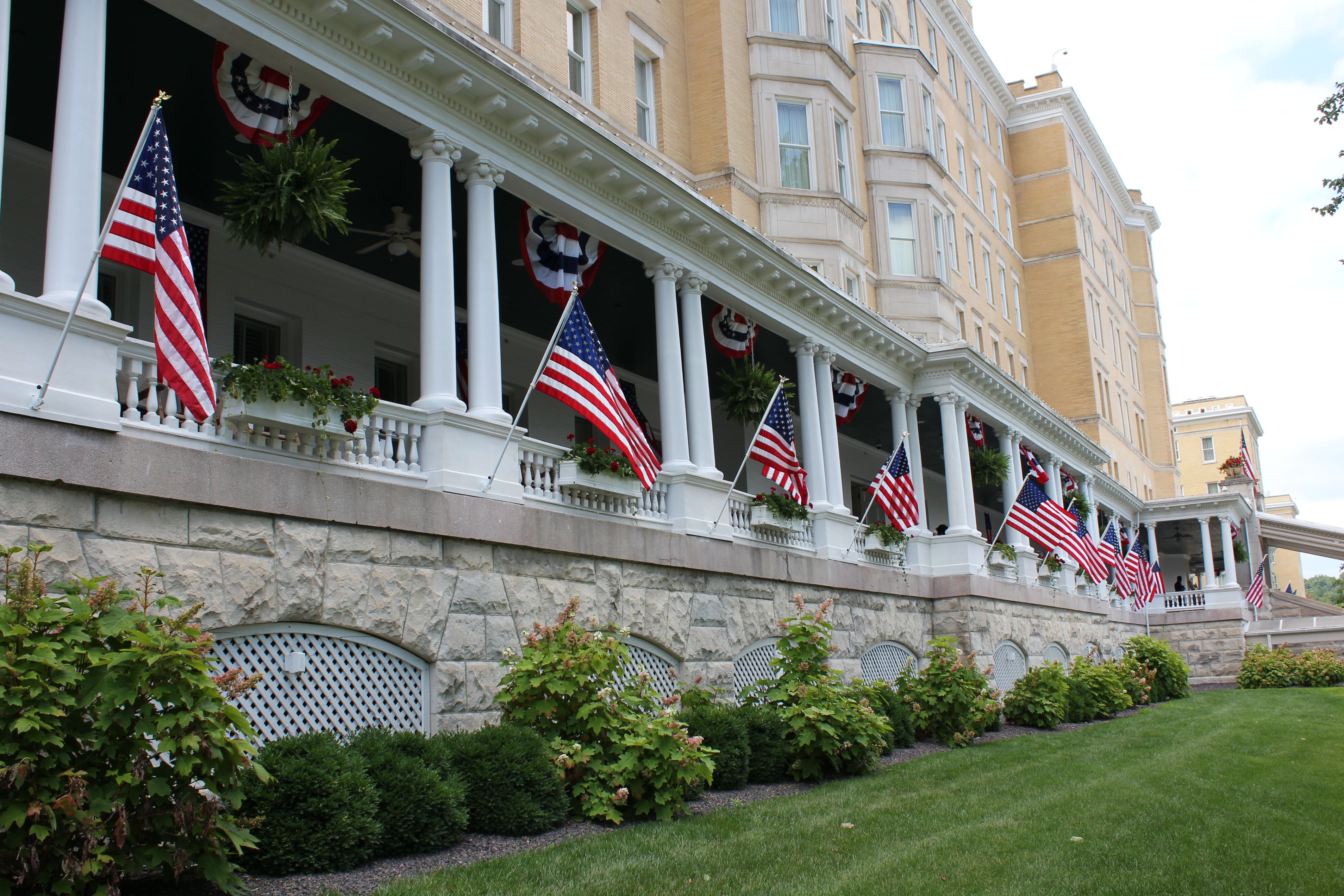 a building with flags on the front