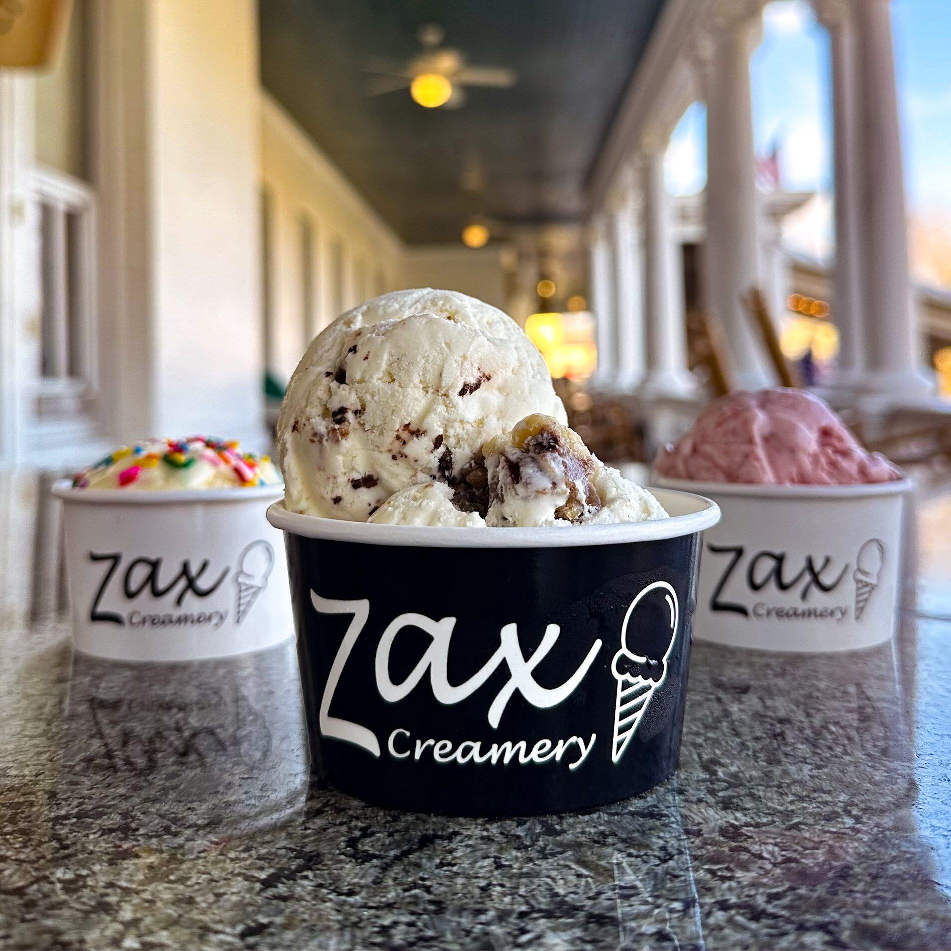 a group of ice cream cups on a counter