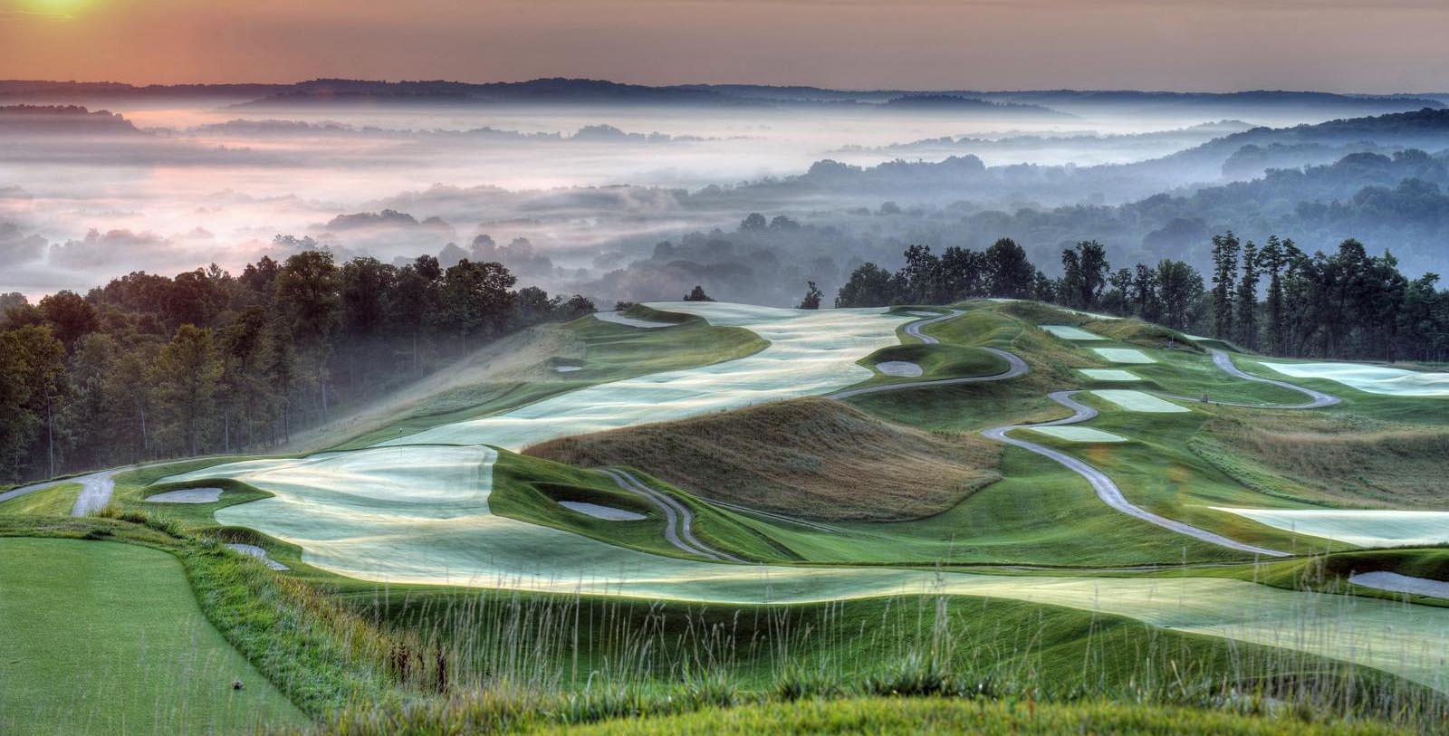 a golf course with a winding path