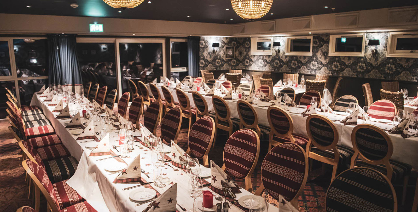 a large room with tables and chairs