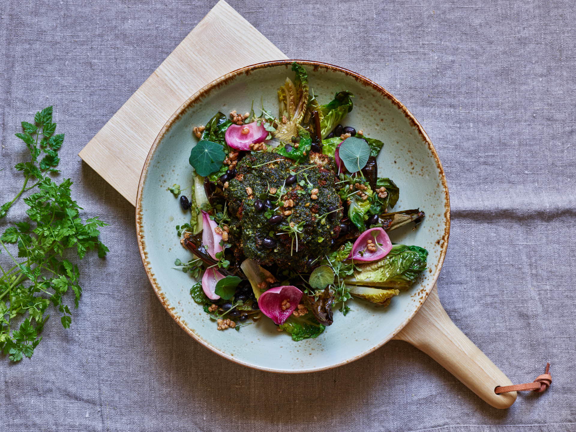 a plate of food on a cutting board
