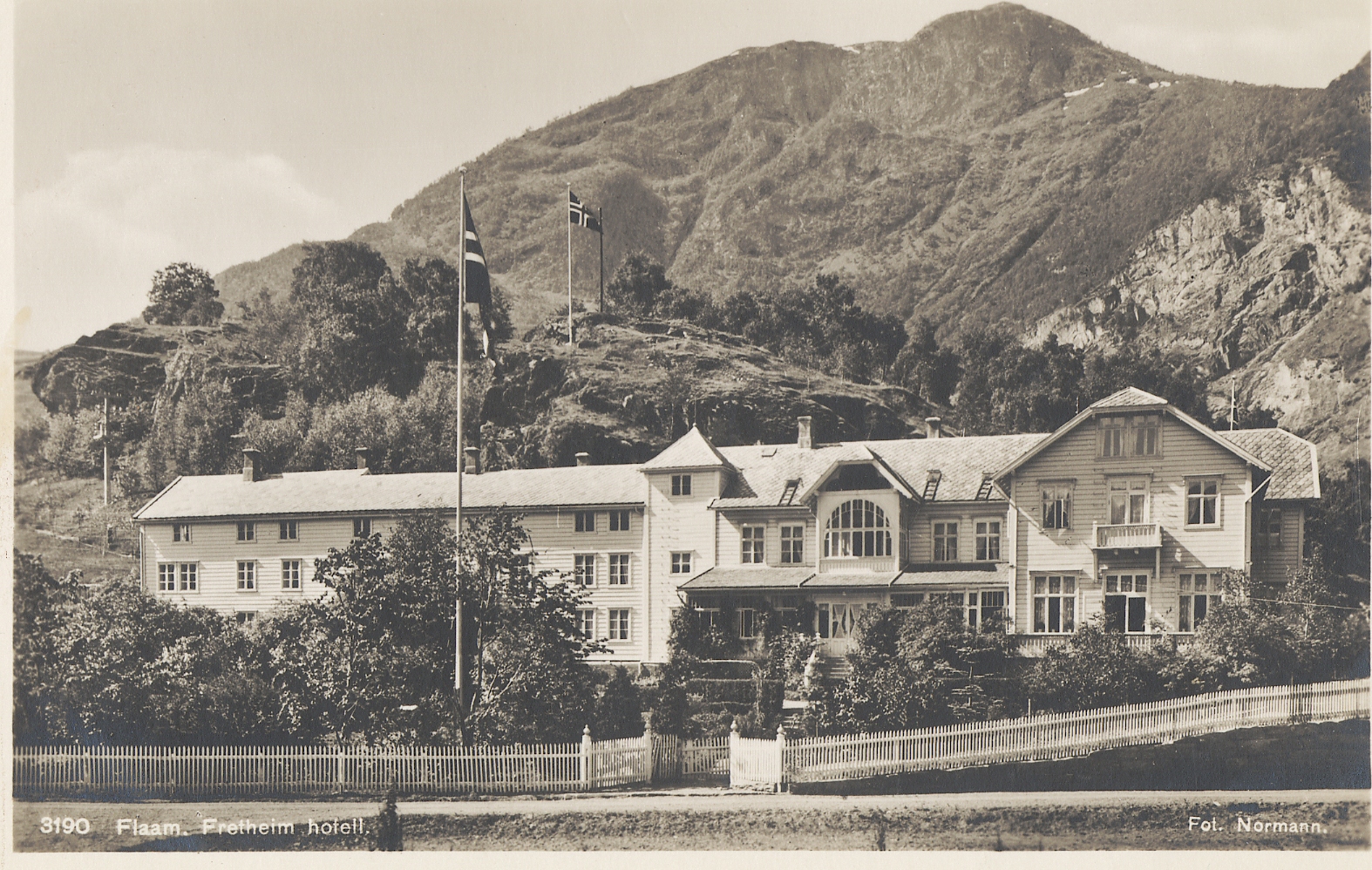 a building with a flag on the side