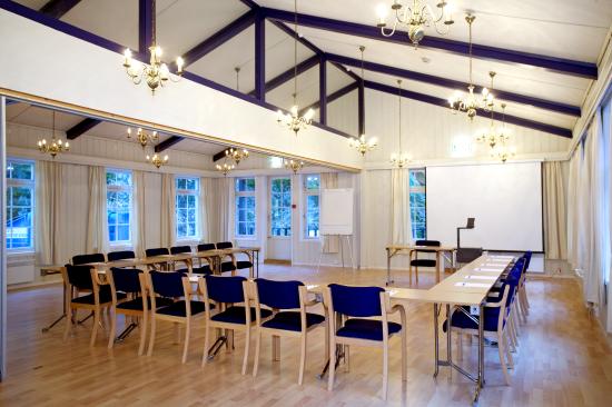 a room with tables and chairs