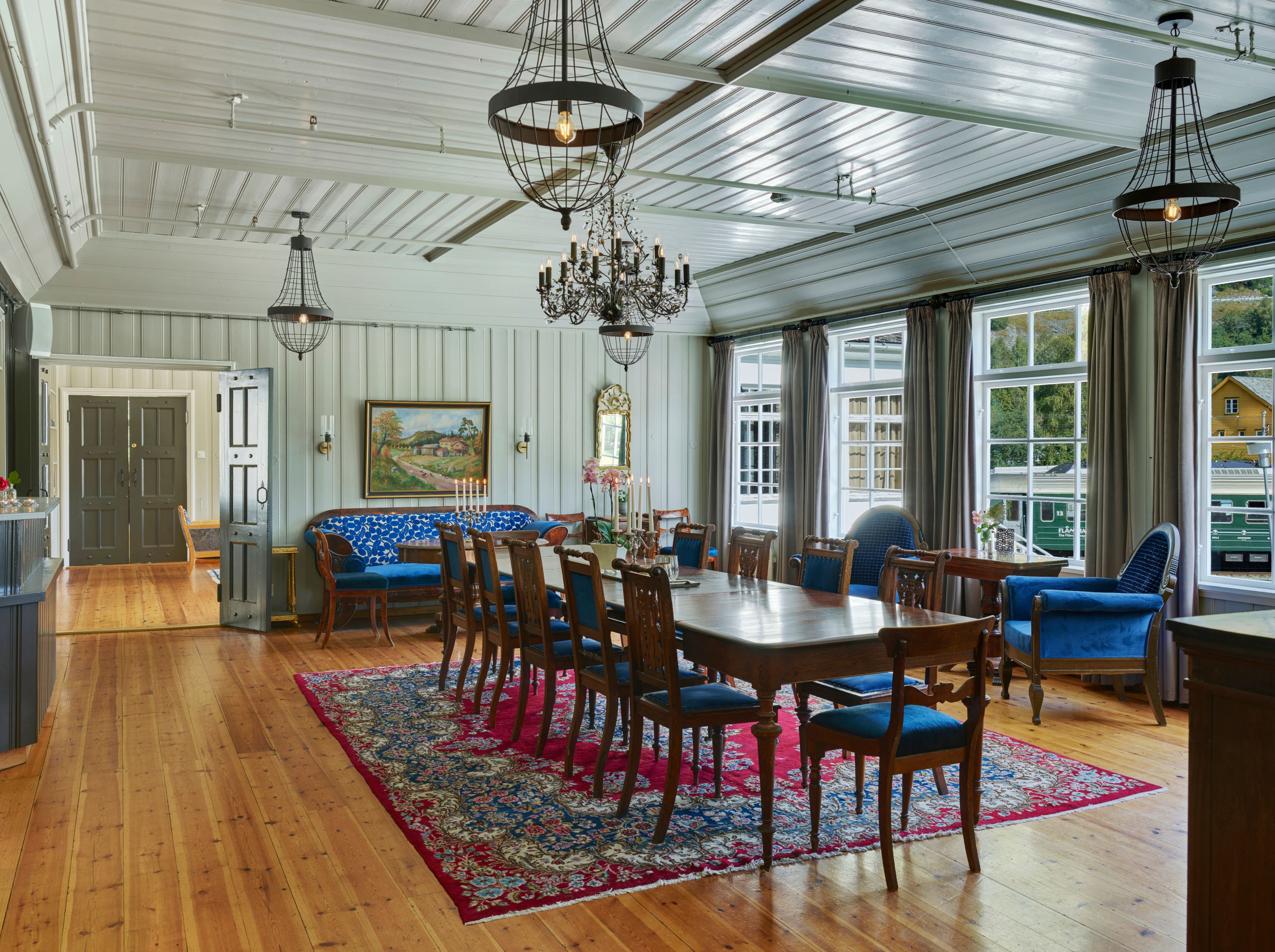 a room with a table and chairs